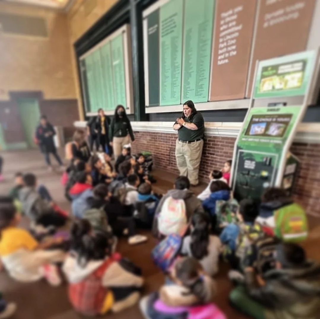  CJ instructs class of young students about animal adaptations