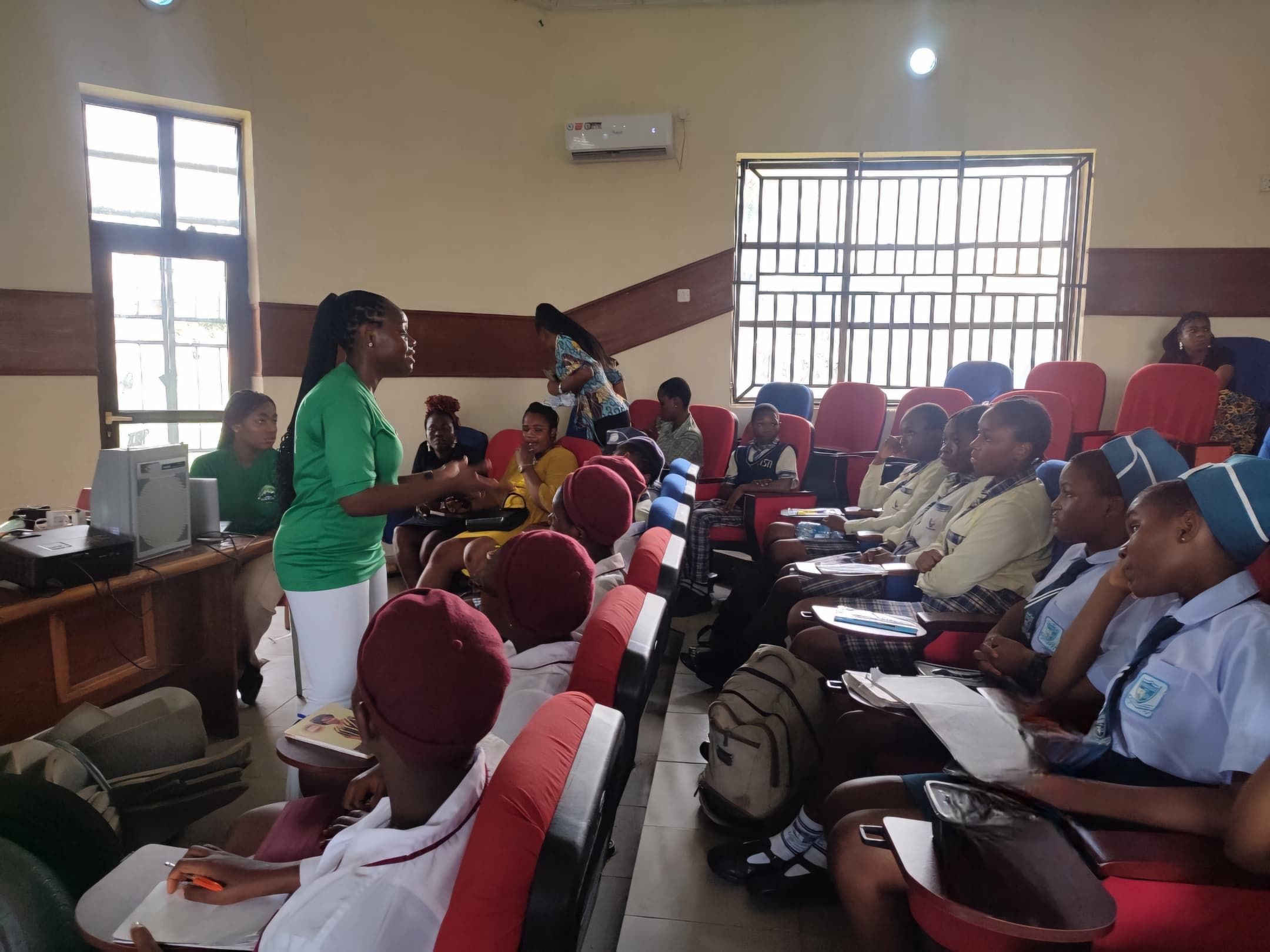 Mmachukwu explaining the concept of upcycling to the students during the Climate Bootcamp.