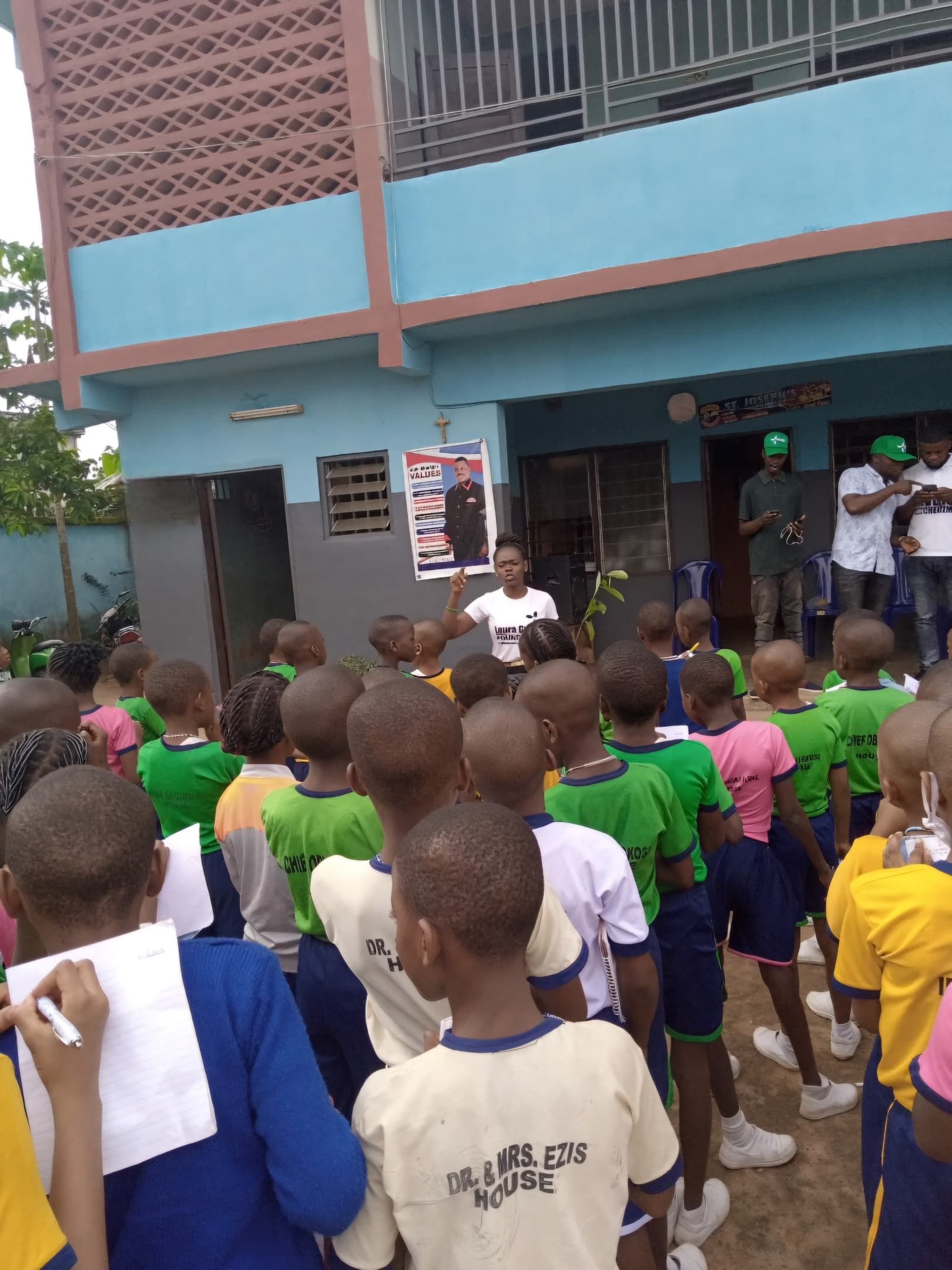 Mmachukwu with students of St. Joseph Nursery and Primary School Nnewi during the School Regreen and sensitization project