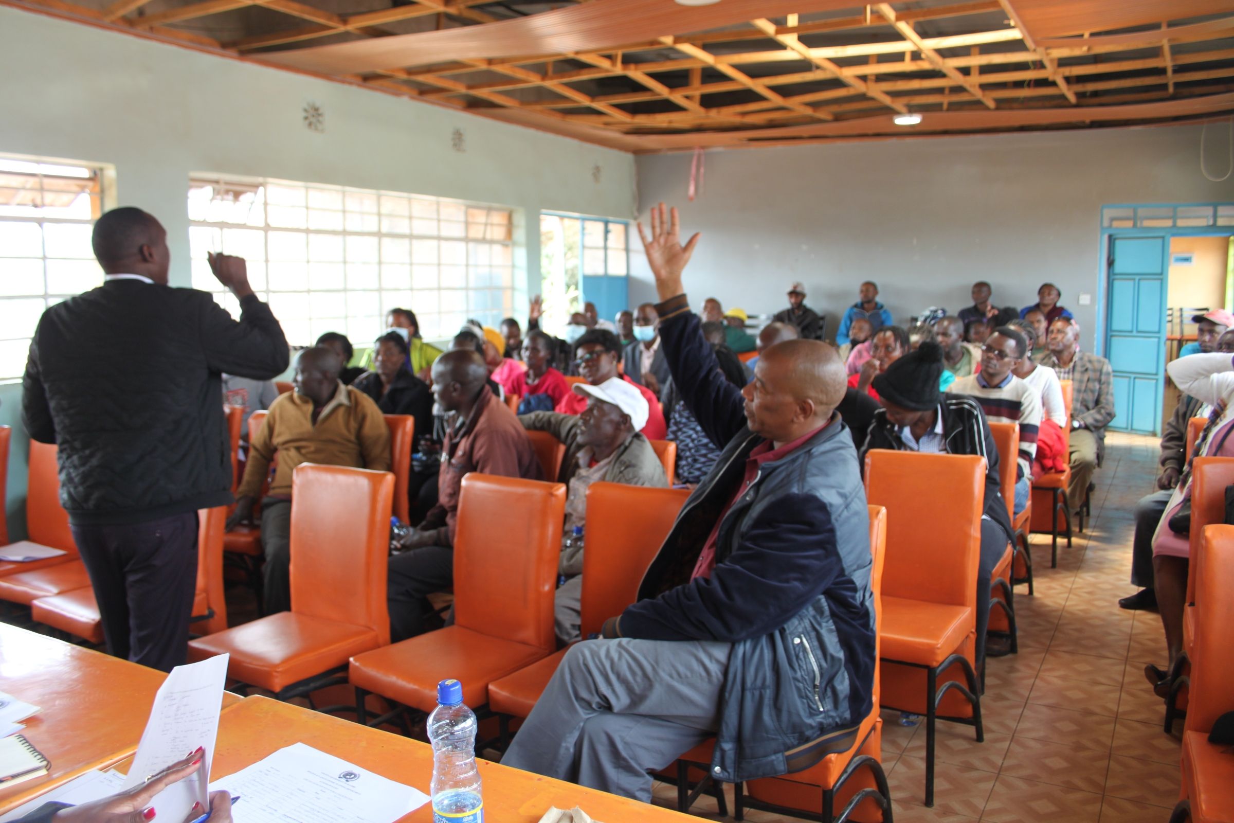 Richard making a presentation to Kikuyu Sub County residents on water resource development planning in September 2022