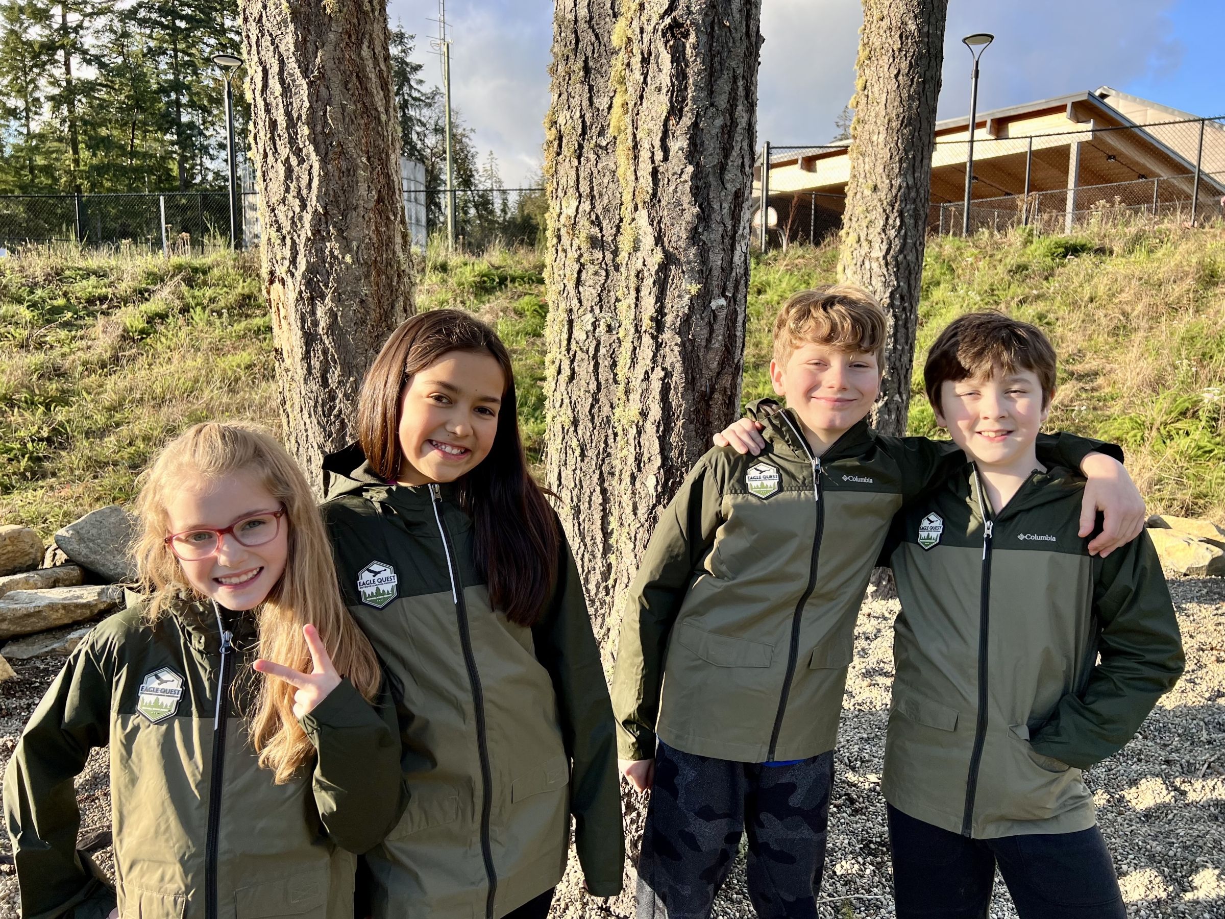 Group of four kids outside
