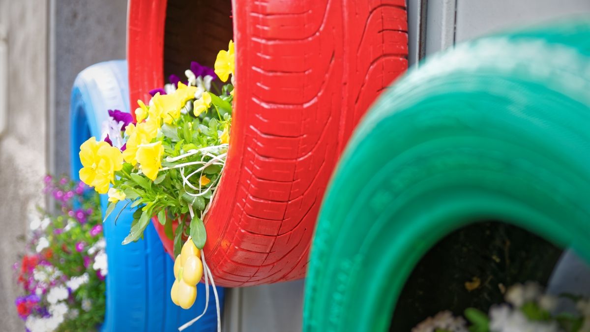 Colorful tires turned into flower planters