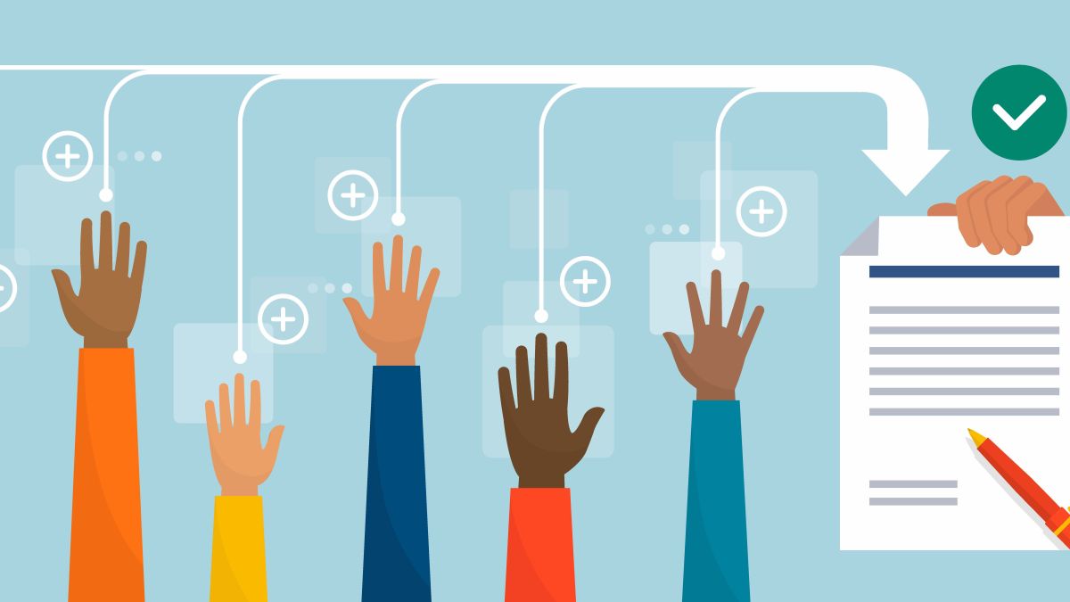 raised hands from multiple races