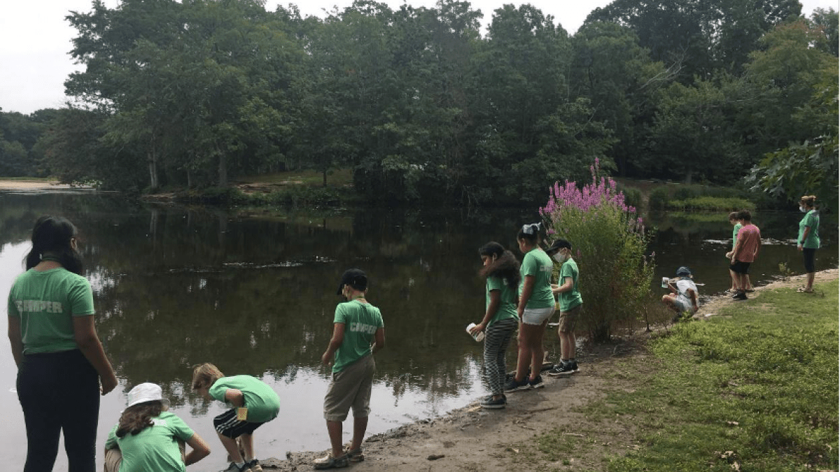 Gladstone Elementary School 21st CCLC and NOAA/NAAEE participants in the Mystic Aquarium program adopting their local watershed and doing a marine debris clean up.