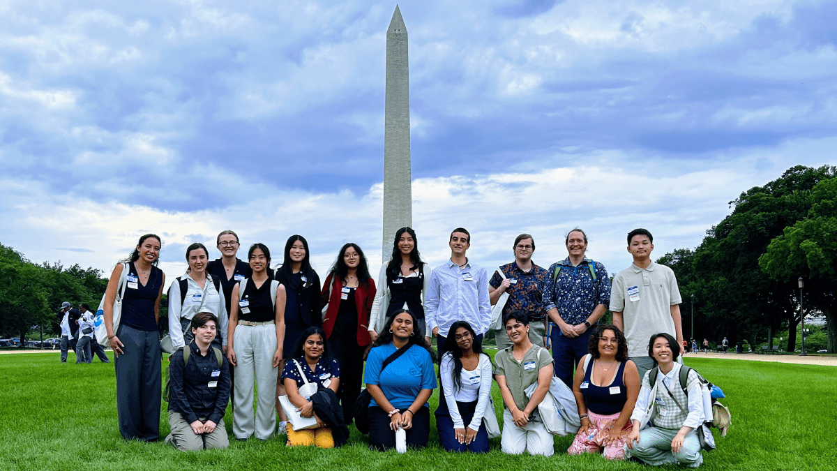 Group of Young Changemakers Fellows standing in front of the Washington Monument