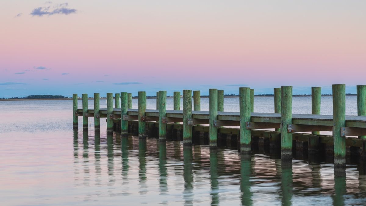 A fishing pier at sunset
