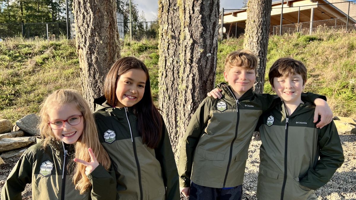 Group of four kids outside