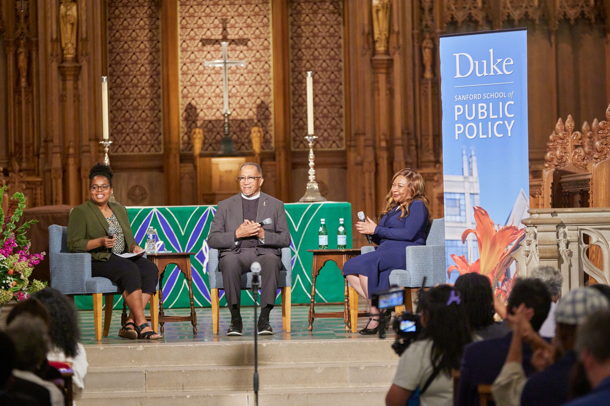 Cameron sitting in conversation with Environmental Justice Movement leaders Rev. Dr. Benjamin Chavis and Catherine Flowers as a part of Duke University distinguished lecture she organized. 