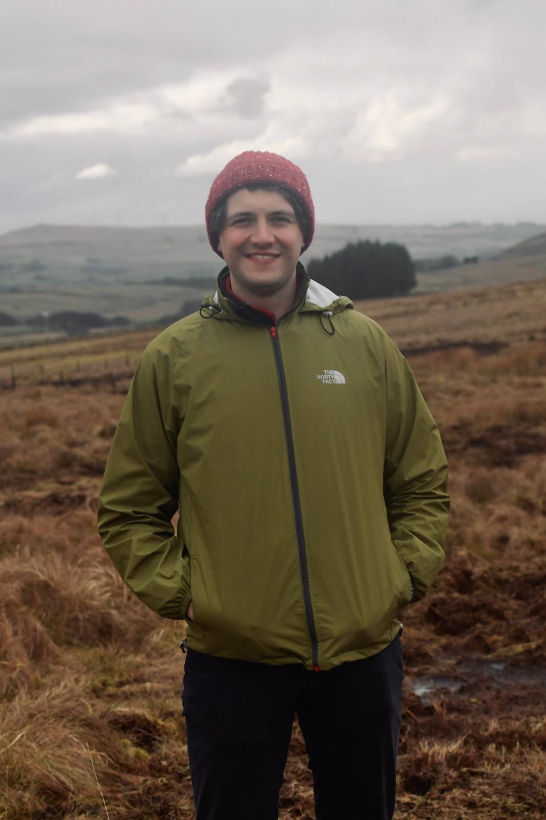 Ruairi on a visit to a peatland restoration site in County Antrim, Northern Ireland, where he communicated the value of nature based solutions. Credit: Dakota Reid.