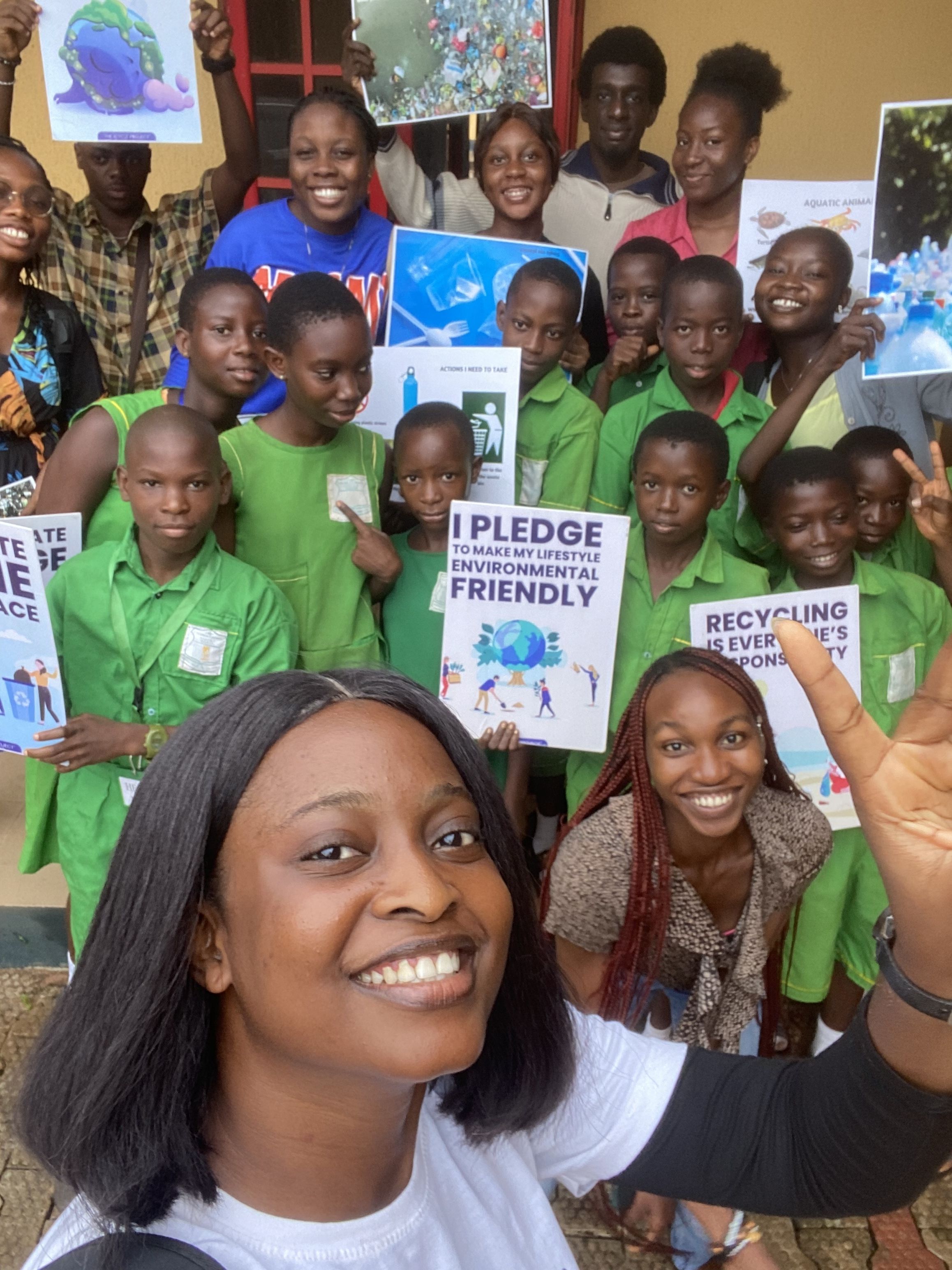 Favour and the Pledge for Nature volunteer team and pupils at Army Children School in Benin City, Nigeria.