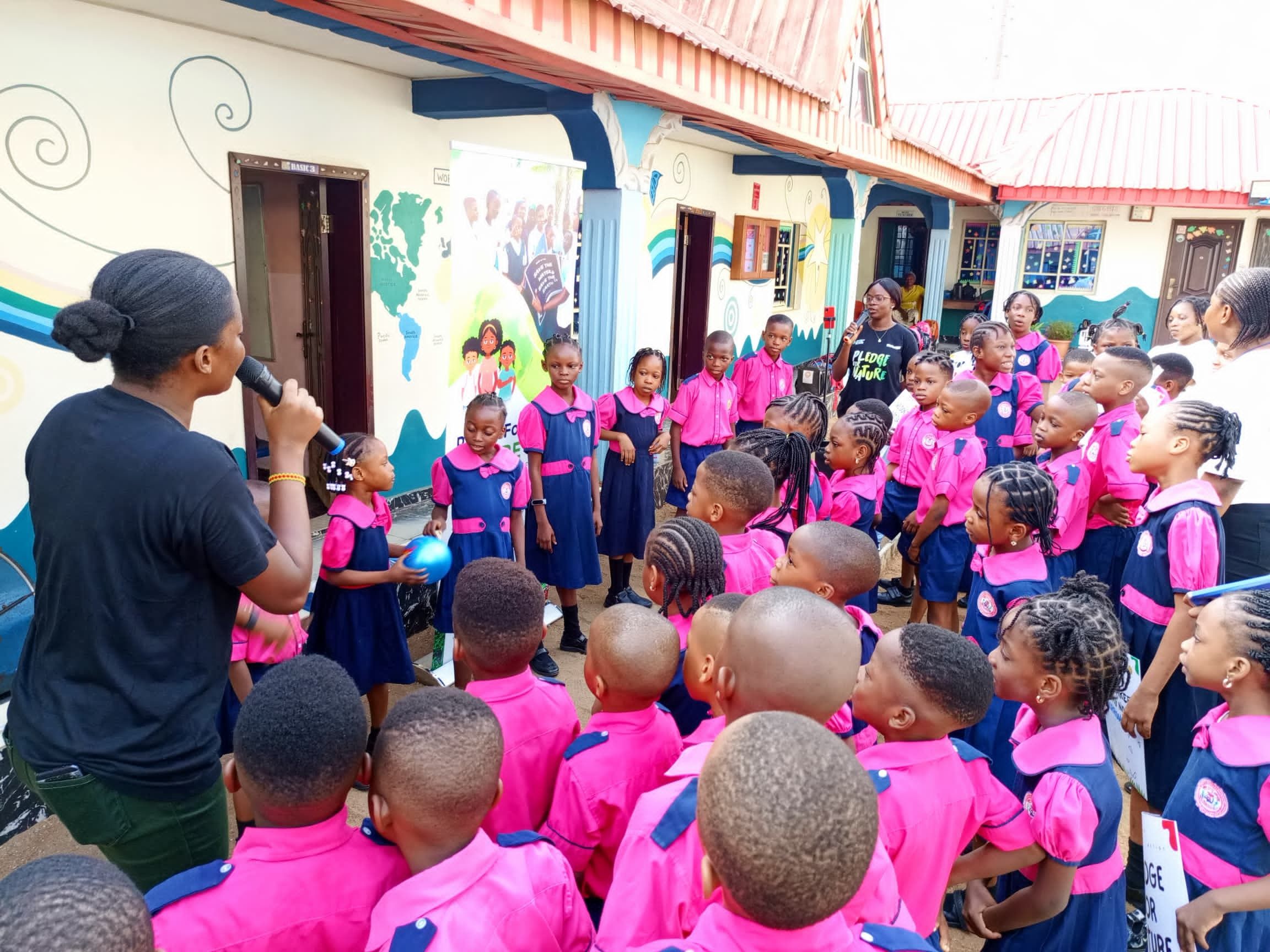 Favour teaching pupils during a Pledge for Nature Workshop at World Class Academy in Lagos, Nigeria.