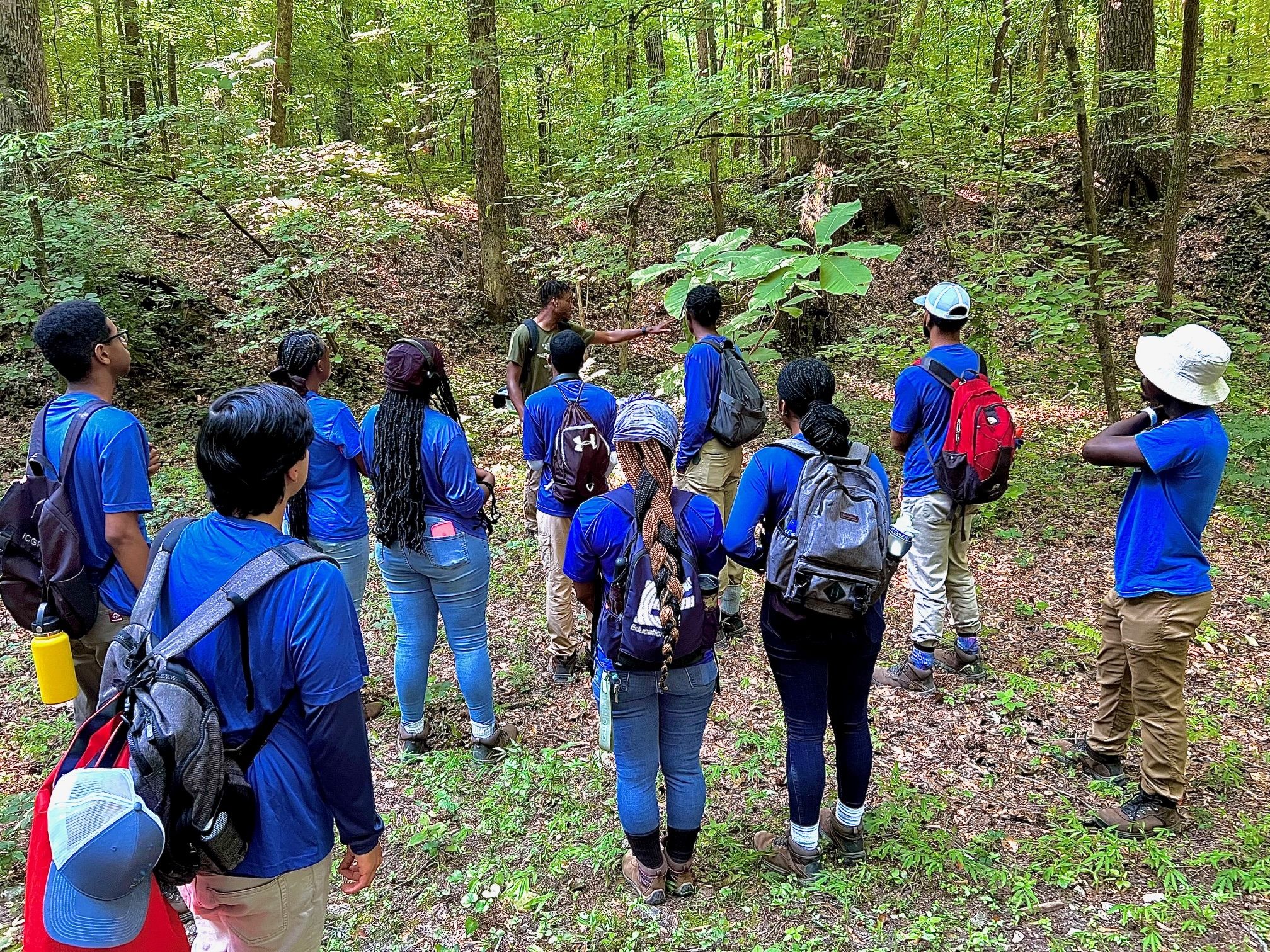 Dajawn Williams leads The UPS group of the Student Conservation Association through am education hike to properly engage members to the intention and impact of conservation on the local level! 