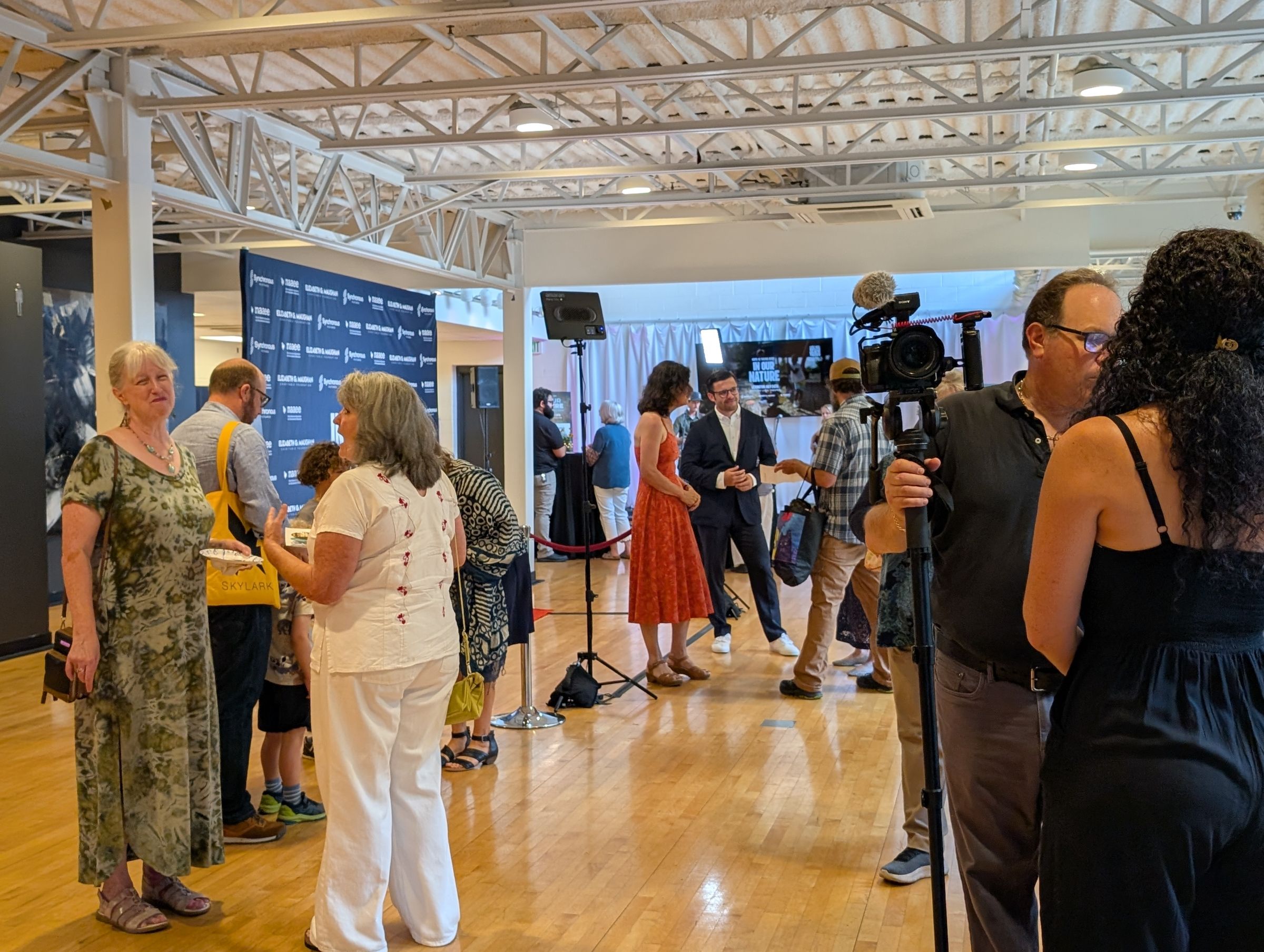 People mingle at the Lexington premier of In Our Nature.