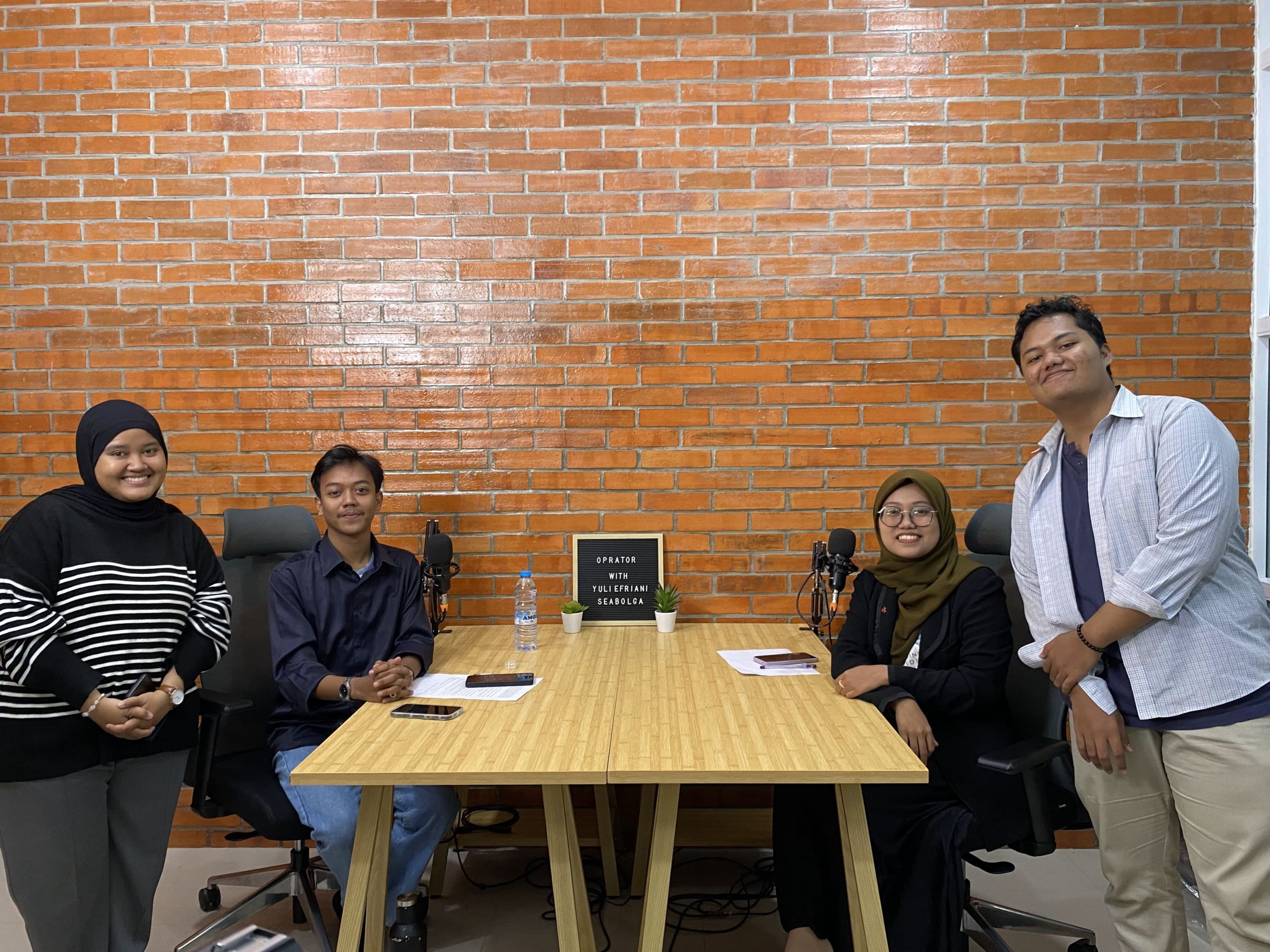 A group of people at a table. 