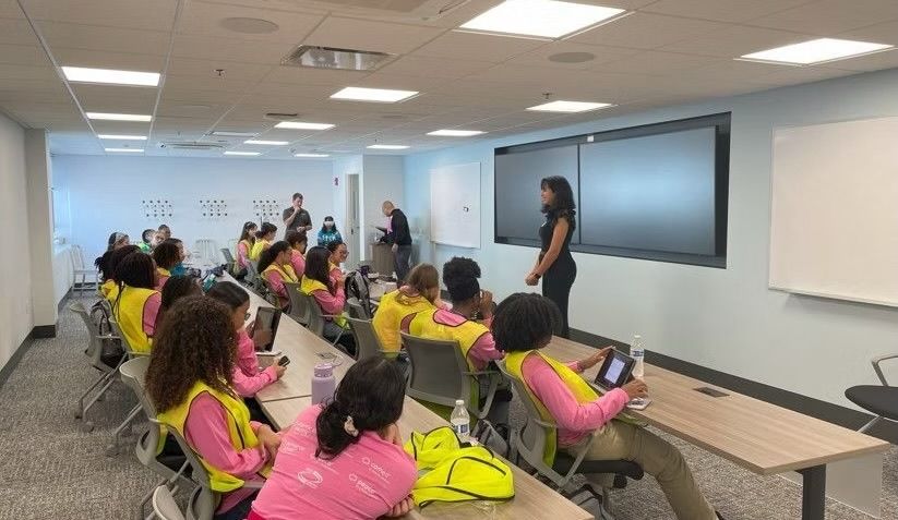 A woman teaching a class.
