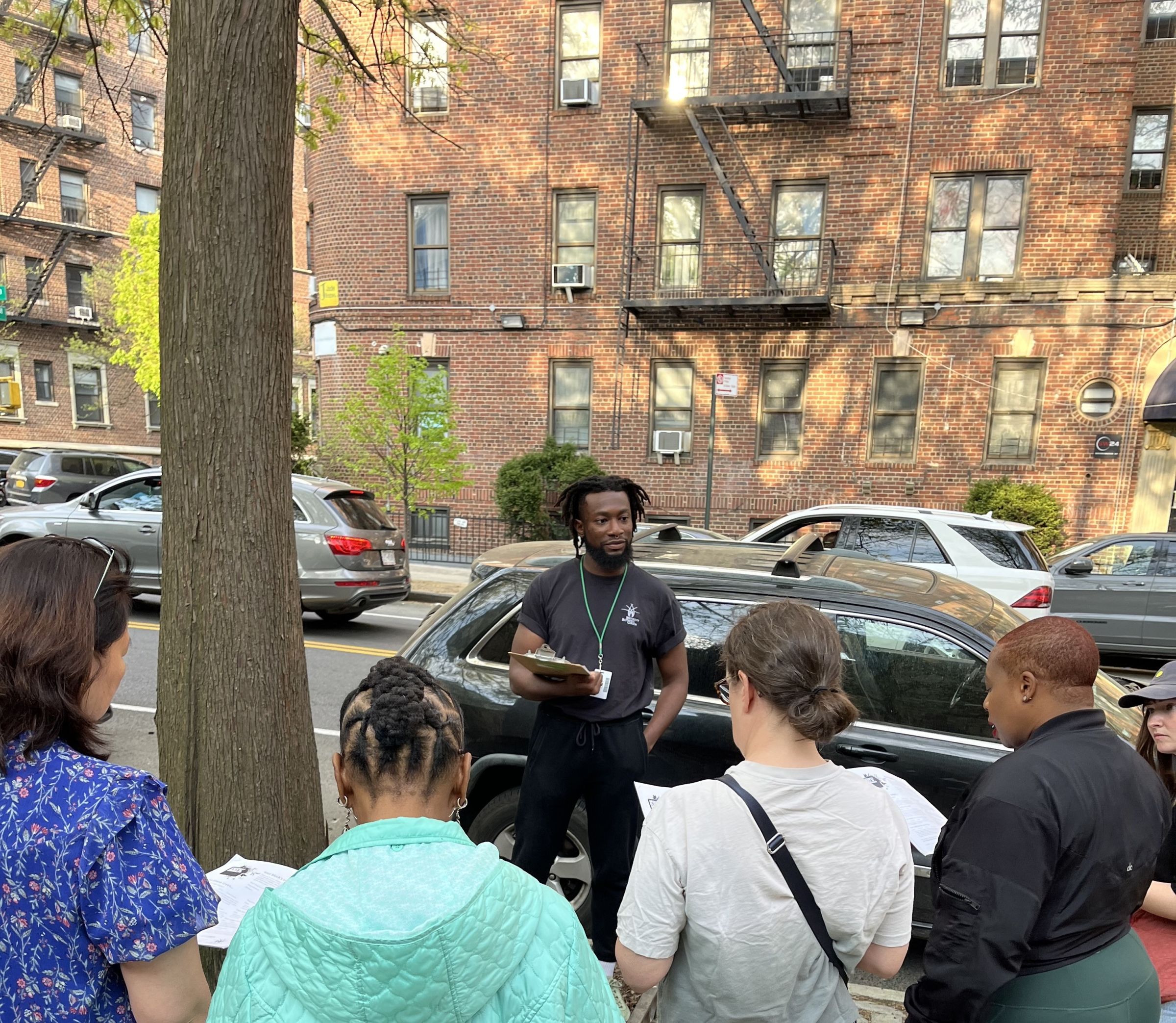 EE 30 Under 30 Awardee Jibreel leading a tree bed care session