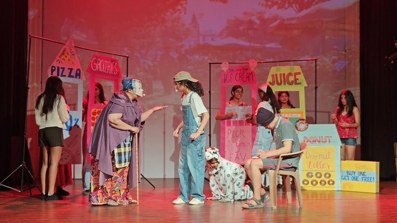 A group of performers on stage.